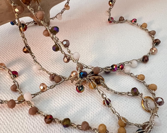 Long crochet necklace with golden bronze thread and crystals, Textile jewel by Piera Romeo