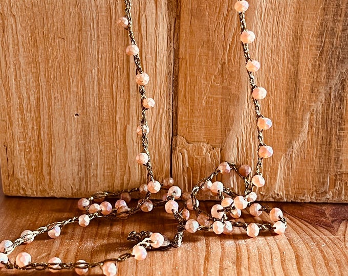 Long crochet necklace with golden bronze thread and crystals, Textile jewel by Piera Romeo