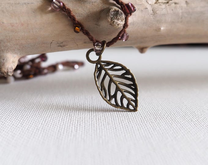 Long crochet necklace with bronze leaf, Textile jewel by Piera Romeo