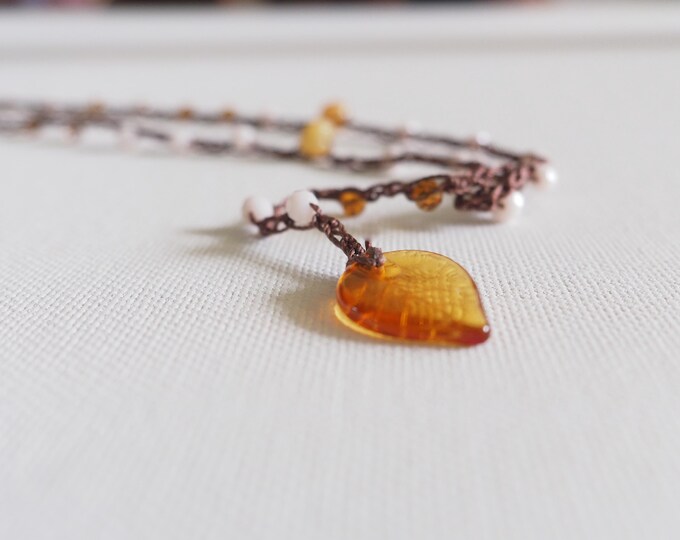 Long crochet necklace with crystal leaf, Textile jewel by Piera Romeo
