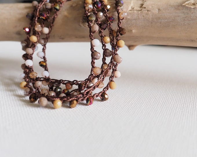 Long crochet necklace with brown thread and Cappuccino color crystals, Textile jewel by Piera Romeo