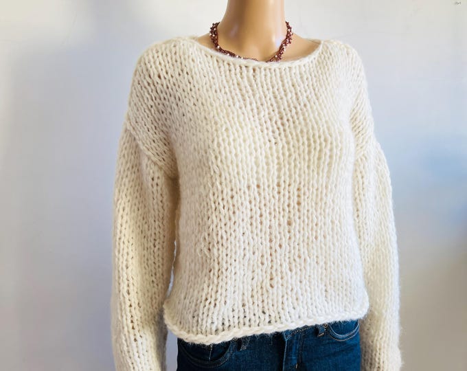 Maglione bianco per l'inverno in pura lana