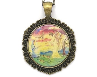 May include: A bronze necklace with a round pendant featuring a watercolor painting of an angel with wings, a woman, and a bird in a colorful landscape.