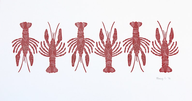 This is an original hand carved block print of a red crawfish or lobster pattern on fine art paper.
