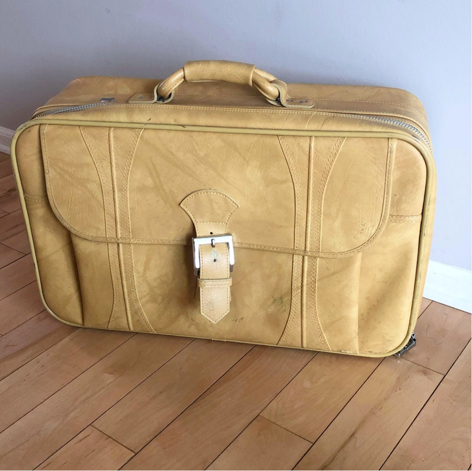 vintage american tourister luggage yellow