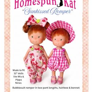 May include: Two dolls with red hair wearing outfits from the Homespun Kat Sunkissed Romper PDF digital pattern. One doll wears a cherry-print romper and hairbow, the other a pink gingham romper and bonnet. Made to fit 12-inch dolls like Mia and Pippa Nines.