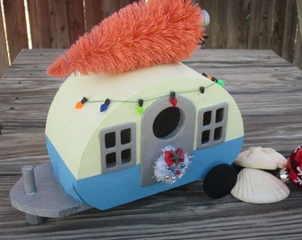 Christmas Camper Hauling Tree with Starfish topped Wreath decoration