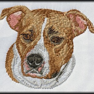 May include: Embroidered image of a brown and white dog with a white collar. The dog has brown fur, a white muzzle, and brown eyes.