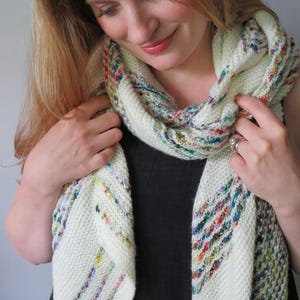 Splatter Paint wrap or scarf pattern - bias knit fingering weight wrap with three lace and surface textures. Great for multicolor yarns