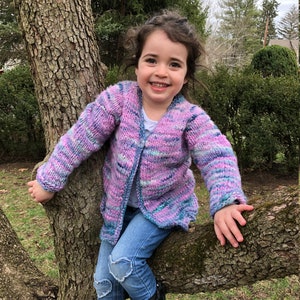 Mermaid Cardi Knitting Pattern - 2, 4, 6, 8, 10 baby to child sizing cardigan using chunky weight yarn with waves and a mermaid fin top-down