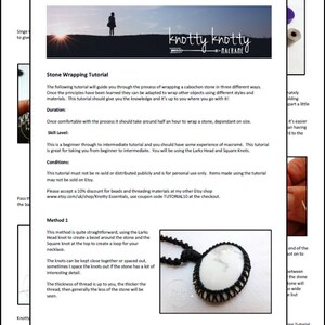May include: A black and white stone wrapped in black macrame cord. The stone is oval shaped and has a smooth, polished surface. The macrame cord is tied in a knot at the top of the stone, creating a loop for a necklace. The text "Stone Wrapping Tutorial" is printed at the bottom of the page.