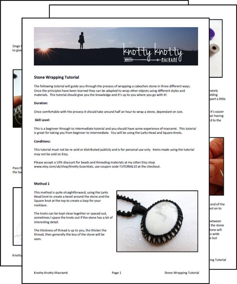 May include: A black and white stone wrapped in black macrame cord. The stone is oval shaped and has a smooth, polished surface. The macrame cord is tied in a knot at the top of the stone, creating a loop for a necklace. The text "Stone Wrapping Tutorial" is printed at the bottom of the page.