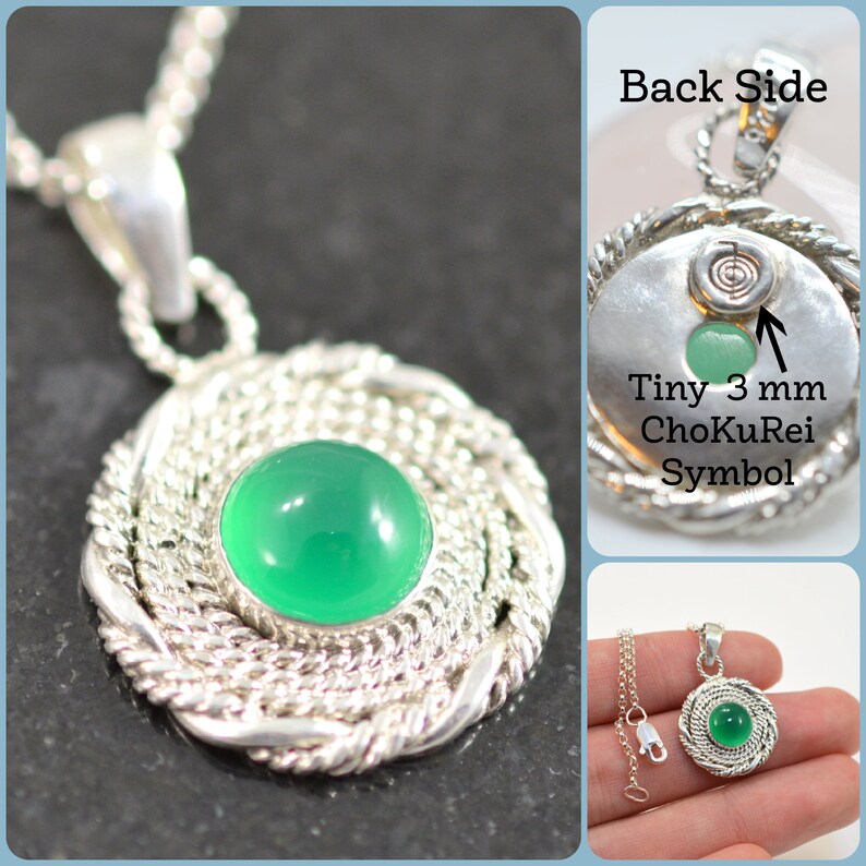 May include: A silver pendant necklace featuring a round, bright green gemstone set within a woven silver design. The back of the pendant has a small green stone and the text "Tiny 3 mm ChokuRei Symbol". The necklace chain is also silver.