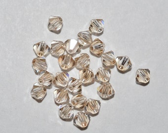 PRECIOSA Crystal - 50 Crystal Honey 4mm Bicone Beads  (H24-2-04)