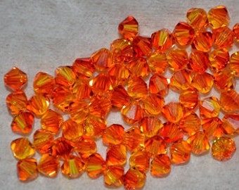 24 - 4mm Genuine Swarovski Crystal Bicone Beads - Fire Opal H1-6-09