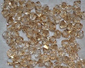 50 - 4mm Genuine Swarovski Crystal Bicone Beads - Golden Shadow (H6-1-02)