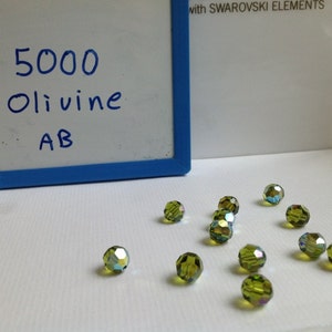 12 Pcs 6mm Genuine Swarovski Olivine AB Crystal Art. 5000 Round Faceted Beads (H15-2-02)