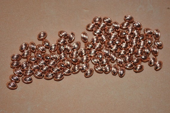 100 Anti Tarnish Copper Smooth 5x3mm Oval Spacer Beads