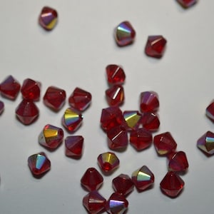 50 5.5mm Crystal Bicone Beads - Siam AB (2043111)