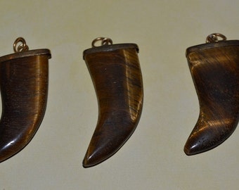 Vintage Tigereye Tusk shaped pendants.(1060210)BayD-TE1-7