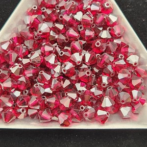 24 - 5mm Genuine Swarovski Crystal Bicone Beads - Ruby Satin H11-4-04