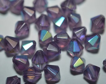50 5,5mm Crystal Bicone Perlen - Amethyst AB (2043109)