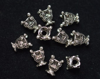 10 Tibetan Style Silver, 12x8mm Oval beads  (3026073) F305