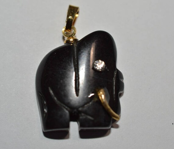 Vintage Black Elephant Carved Pendants With Gold Tusks And - Elephant Tusk Pendant Meaning Vintage Black Elephant Carved Pendants With Gold Tusks And - Elephant Tusk Pendant Meaning