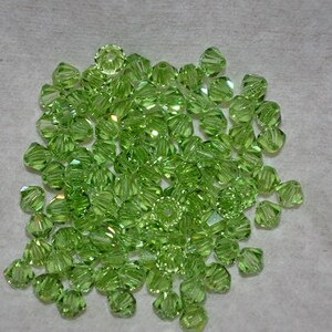 24 PERIDOT 4mm Bicone Beads - Article 5301 4mm,  Peridot Swarovski Beads H2-6-03