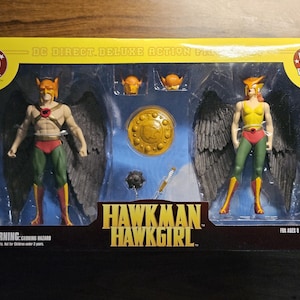 May include: DC Direct Deluxe Action Figure set featuring Hawkman and Hawkgirl. The figures have removable helmets and realistic flapping wings. The packaging includes a shield and mace. The figures are for ages 8 & up.