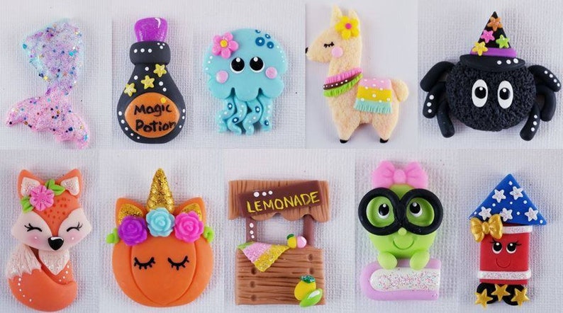 May include: A set of ten colorful polymer clay charms featuring various characters and objects, including a mermaid tail, a magic potion bottle, a jellyfish, a llama, a spider, a fox, a pumpkin with a unicorn horn, a lemonade stand, a frog wearing glasses, and a firework.