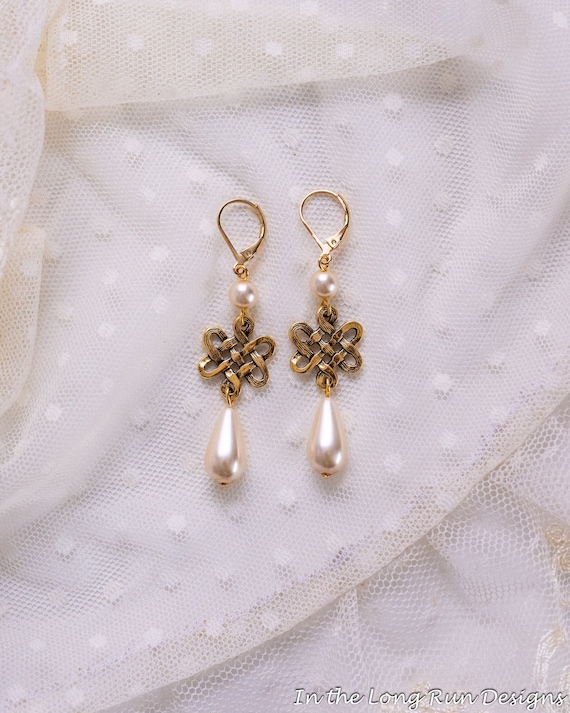 Peach Tassel Earrings with Celtic Knot Design Gold Tone Peach Tassel Earrings with Celtic Knot Design Gold Tone