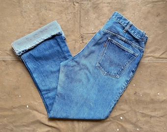 Pantalones vaqueros Levi's de los años 60, talla 32 de cintura, costura simple.