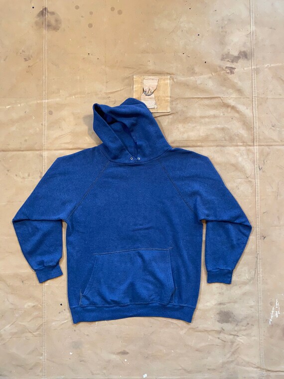 faded blue sweatshirt