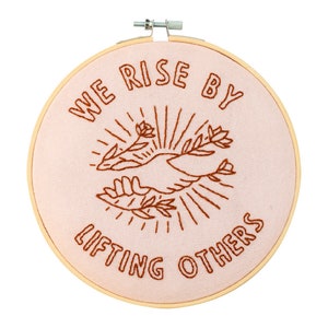 We Rise by Lifting Others Embroidery Hoop Kit Pink with Brown