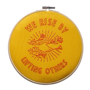 We Rise by Lifting Others Embroidery Hoop Kit Yellow with Red