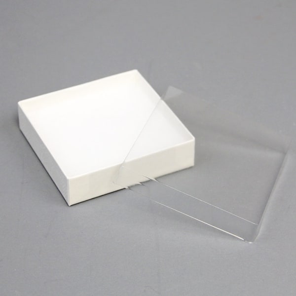White box with clear plastic lid,  3-1/2 inch x 3-1/2 inch x 7/8 inch high, bracelets, earrings, magnets, gifts, necklaces, small jewelry