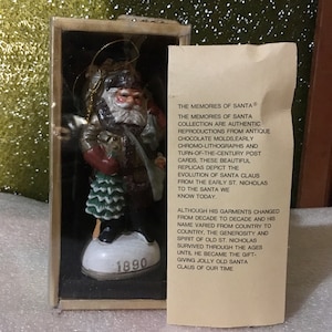 Vintage Hand Painted Version Of The 1890  Santa Holding a Christmas Tree and Carrying many Toys Figurine in Original Box with Brochure