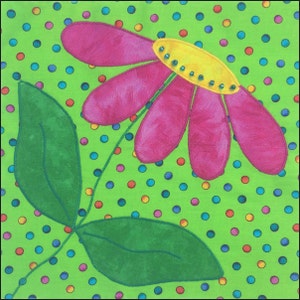 May include: A pink flower with a yellow center and green leaves on a green background with colorful polka dots.