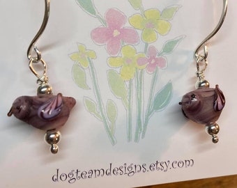 Sweet Lampwork Purple Swirly Birds with sterling beads hanging on Sterling handmade hammered round earwires.