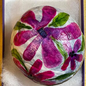 Amazing large 5 inch Round Watercolor-handpainted Flower rock sprayed with polyurethane gloss to be used for paperweight or garden stone.