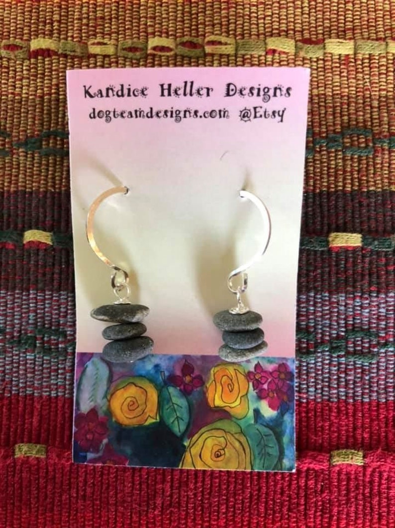 Beautiful earrings made of stacked tiny stones center drilled on a silver headpin hanging on handmade hammered round earwires.