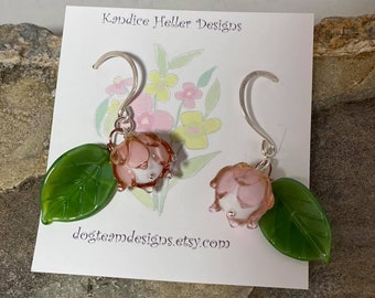 Gorgeous light pink Handblown glass Lampwork Flower earrings with delicate glass leaf hanging on Sterling handmade hammered round earwires.