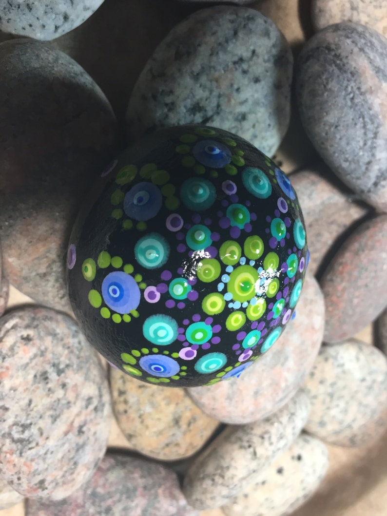 Perfectly Round Rock painted with black background with | Etsy