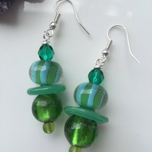 Lampwork glass Green beaded dangly earrings on sterling silver earwires. image 1