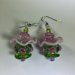 Beautiful Soft pink and green floral handblown glass lampwork dangly earrings on sterling french hook earwires.
