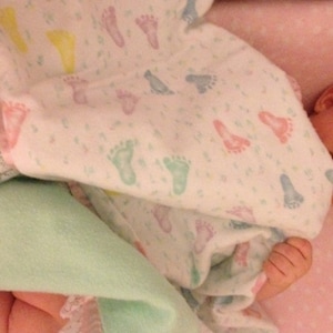 Double sided flannel receiving blankets with trim, burp cloth and bib to match