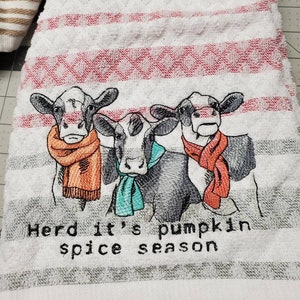 Dressed for pumpkin season cow towel