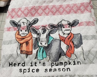 Dressed for pumpkin season cow towel