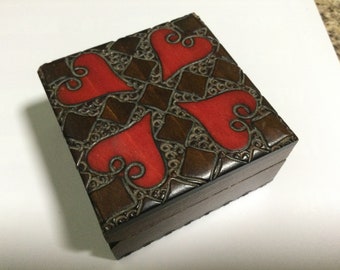 Hand carved polish box with hinged lid. Flower design.